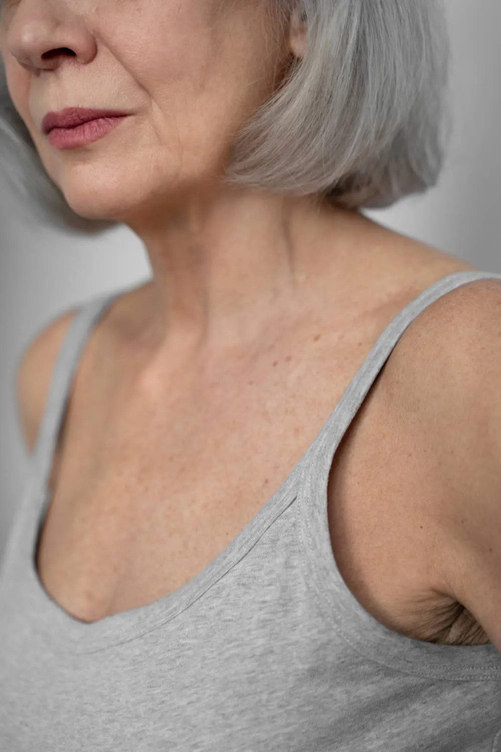 old-woman-upper-chest-no-wrinkles